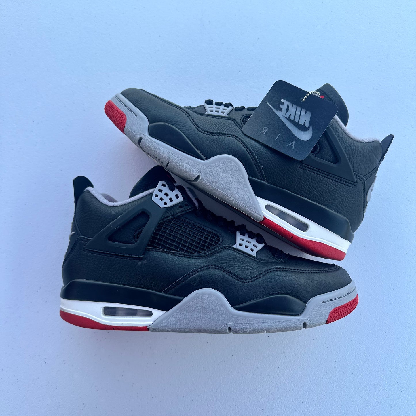 AJ4 Bred Reimagined Size 9